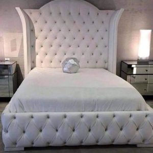 The Crowned Serenity Wingback Bed