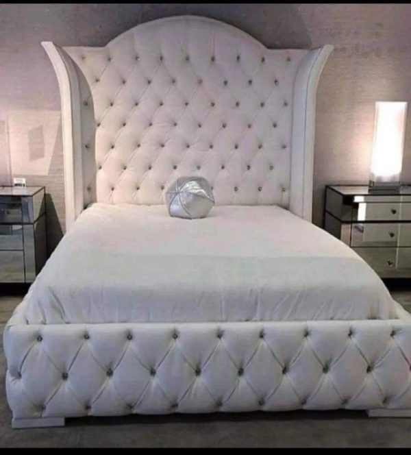 The Crowned Serenity Wingback Bed